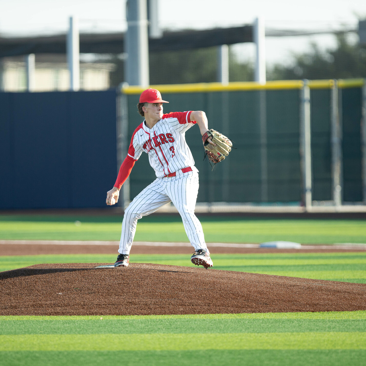 Caleb Koger pitches during Thursday's Regional Quarterfinal between Katy and Tompkins at Cy-Springs.